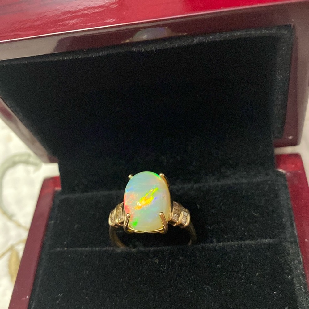 AAA Ethiopian Welo 7.56 cwt Opal and G-H SI Diamond Ring in 10 k gold size 7
